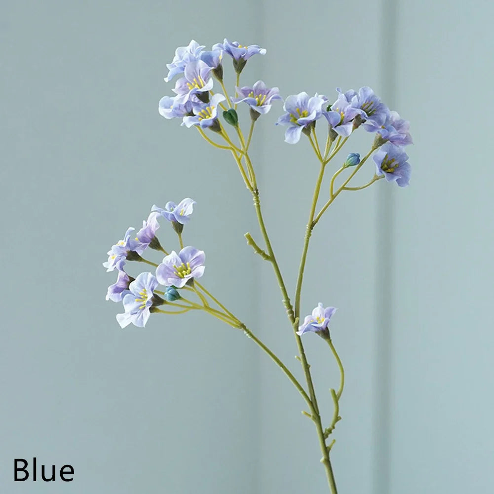 Artificial cornflower decorative flowers in soft blue hues, perfect for home decor and floral arrangements.