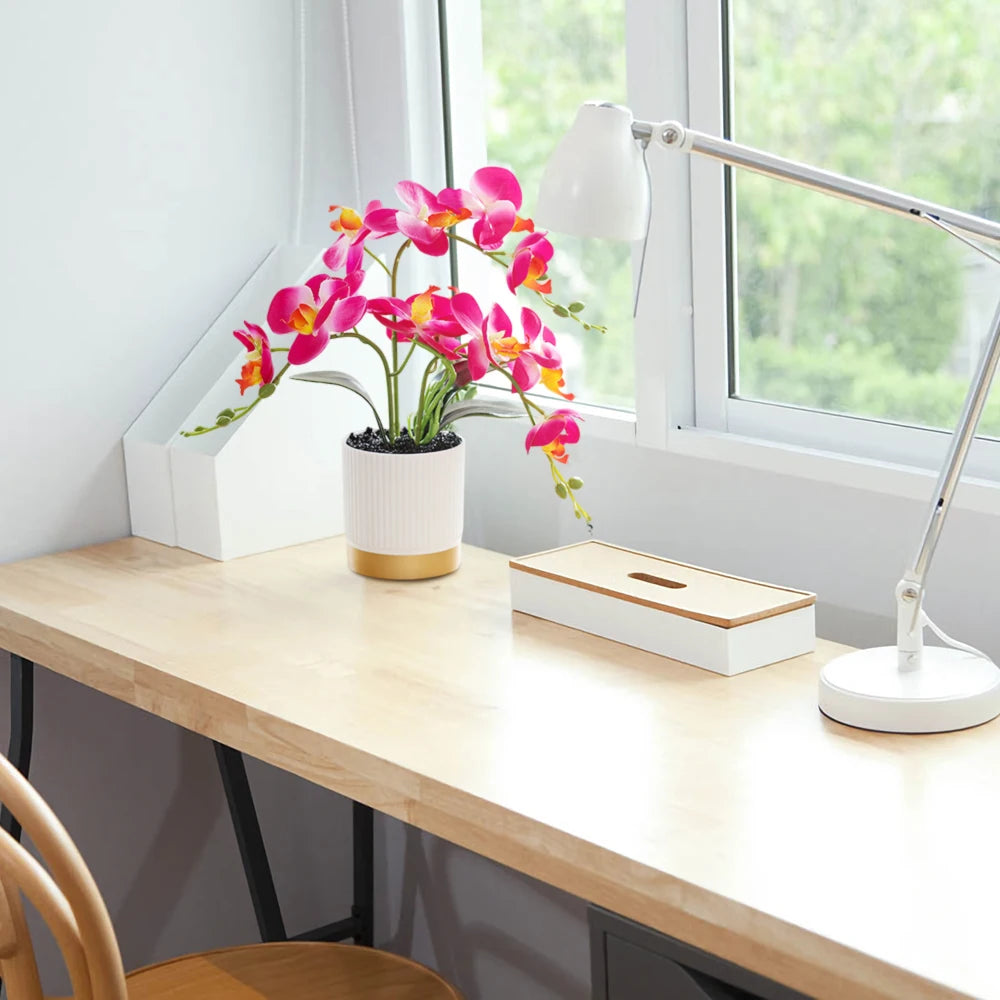 Artificial Phalaenopsis 33cm Artificial Faux arrangement in a stylish ceramic pot on a modern desk.
