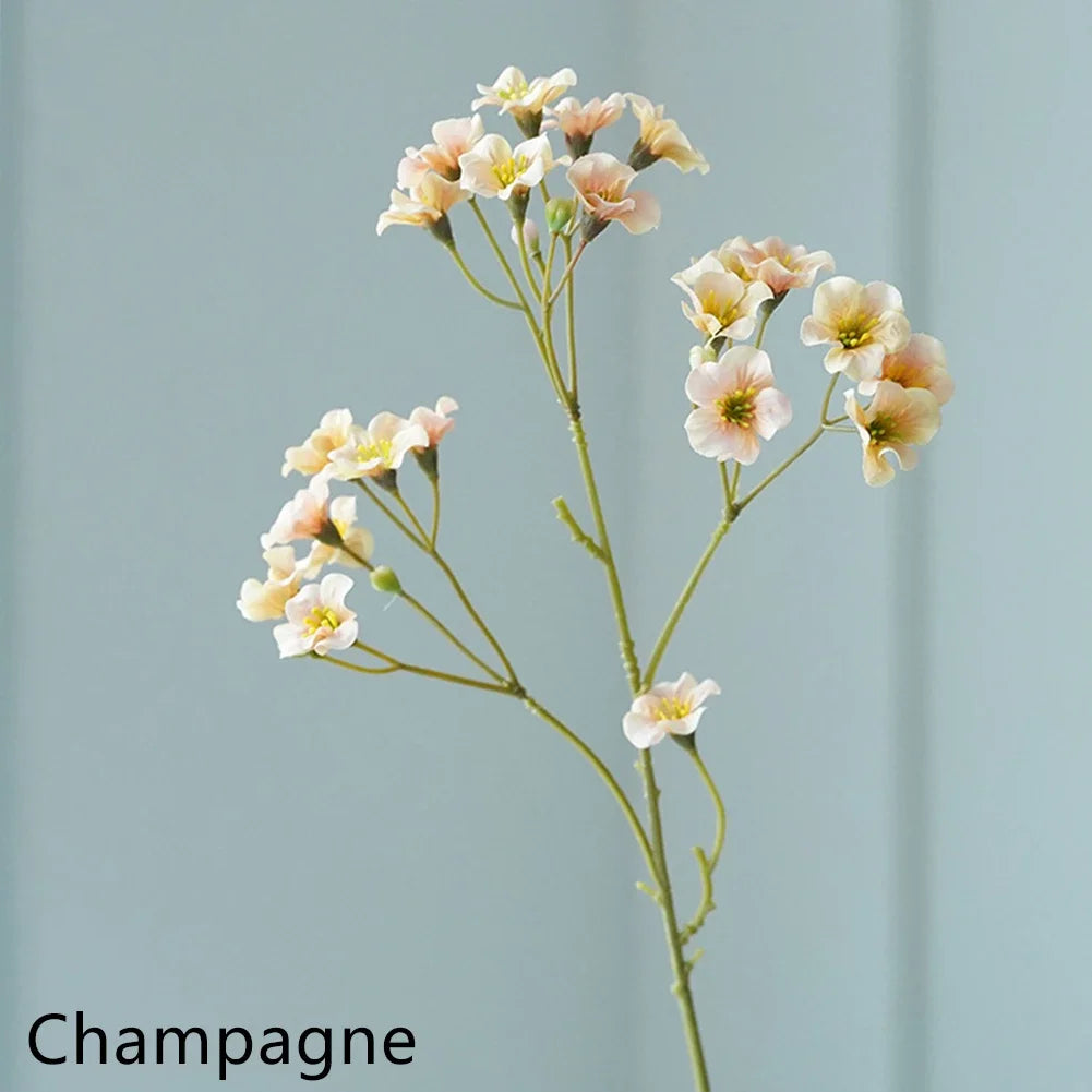 Artificial cornflower decorative flowers in champagne color, showcasing delicate petals and greenery.