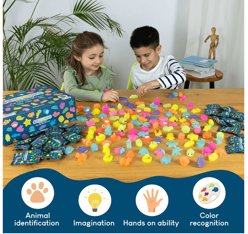 Two children playing with MONKY 80 Mochi Squishy Toys on a table, showcasing colorful squishy toys.