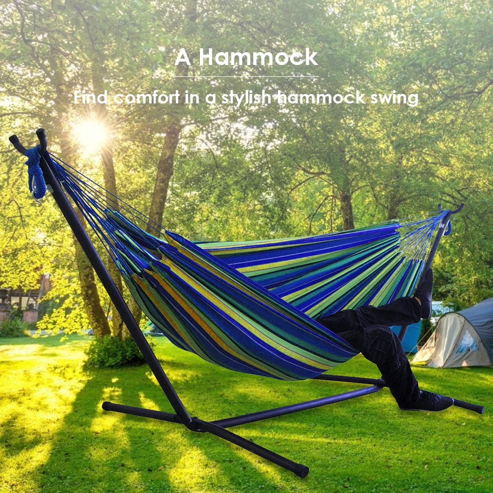 Double Hammock wStand 2-People Hammock & Stand in a sunny outdoor setting with vibrant colors.