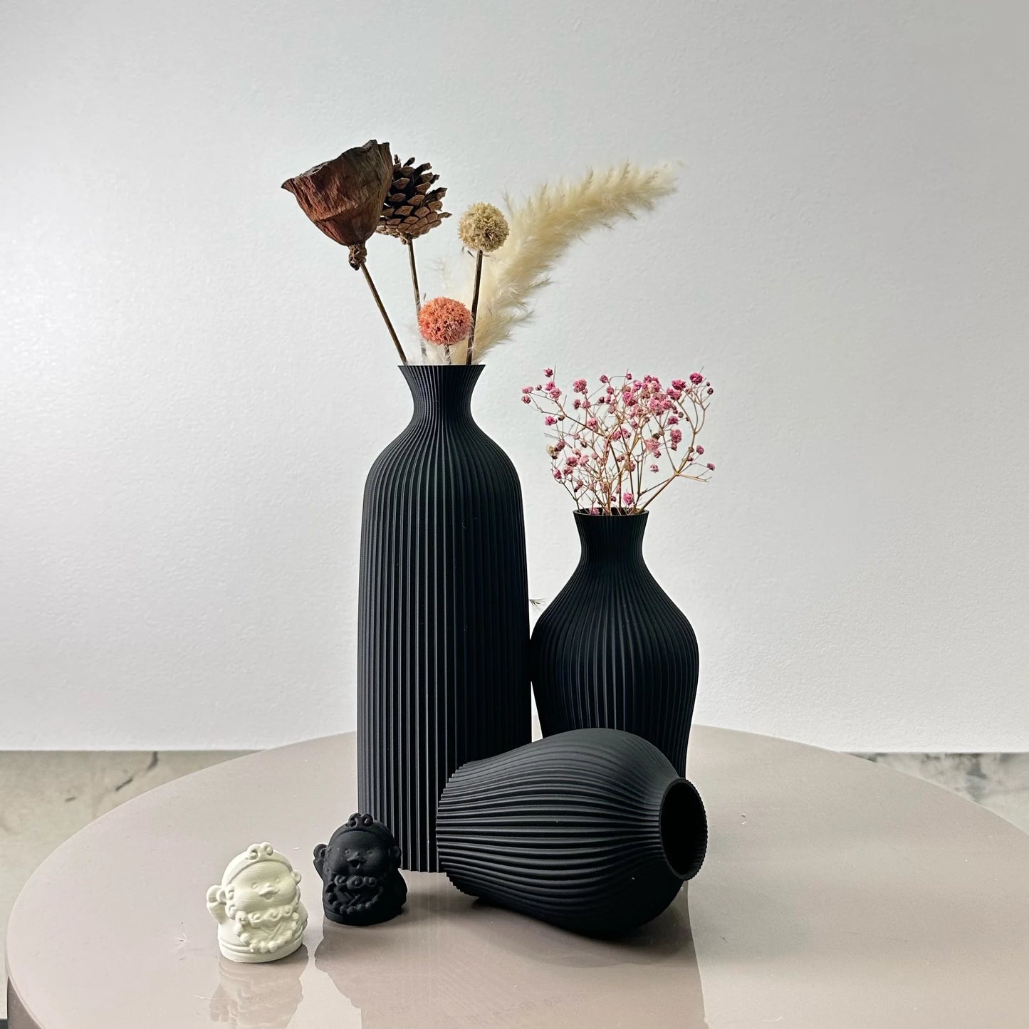 3-Piece Set of Artistic Decorative Vases Elegant Vase with dried flowers on a table for home and office decor.